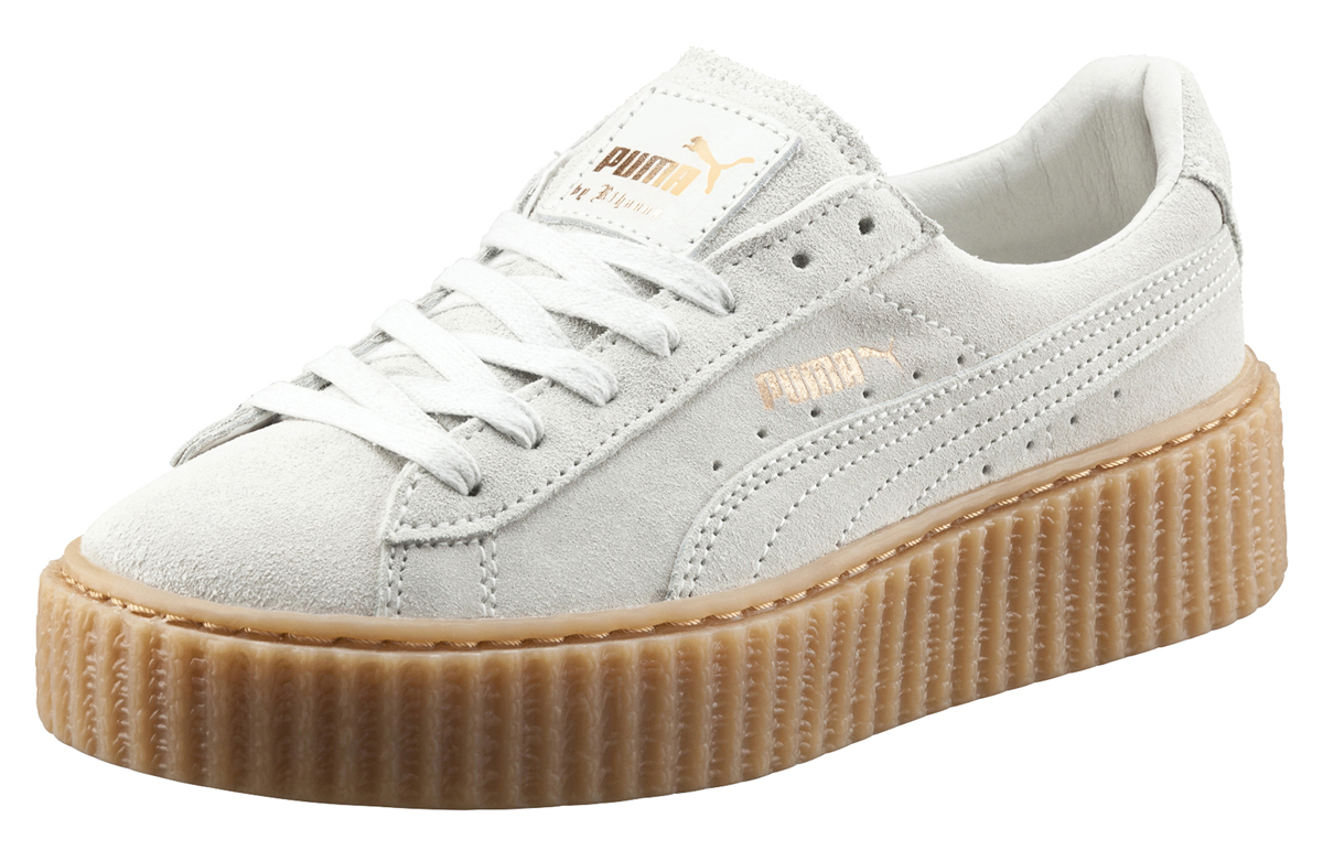 white pumas with peanut butter bottom