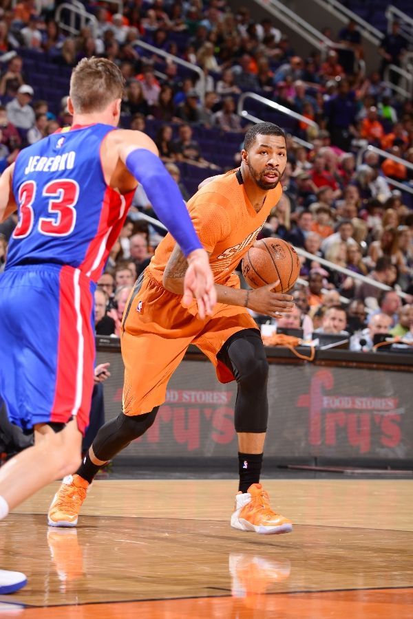 Marcus Morris wearing Nike LeBron XII 12 Orange/White