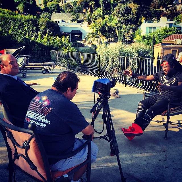 Wale wearing Nike Air Yeezy II 2 Red October