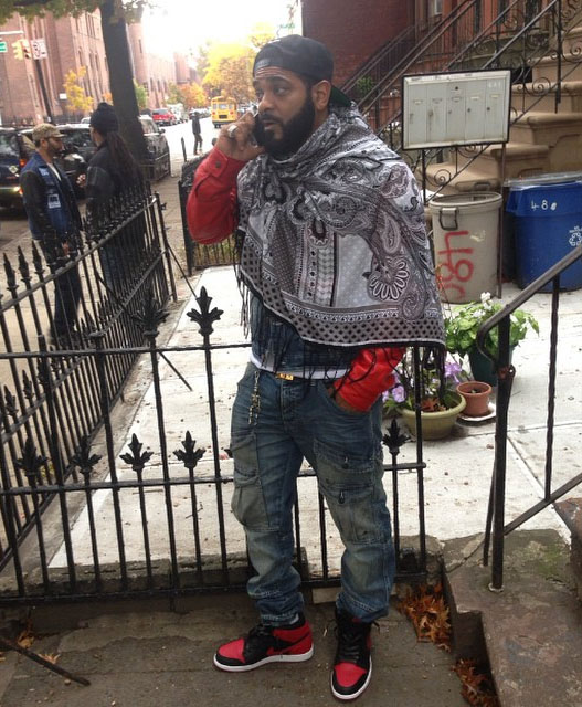 Jim Jones wearing Air Jordan I 1 Bred