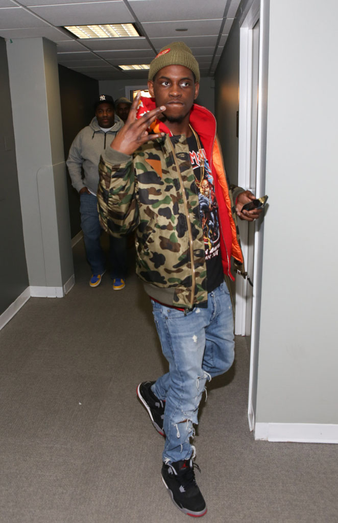 A$AP Nast wearing Air Jordan 4 Retro Black/Cement