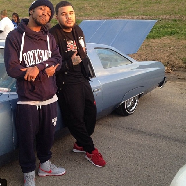 Currensy wearing Nike Air Force 1 Hi