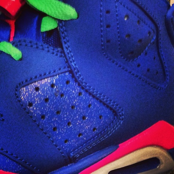 Blue pink and store green jordan 6s