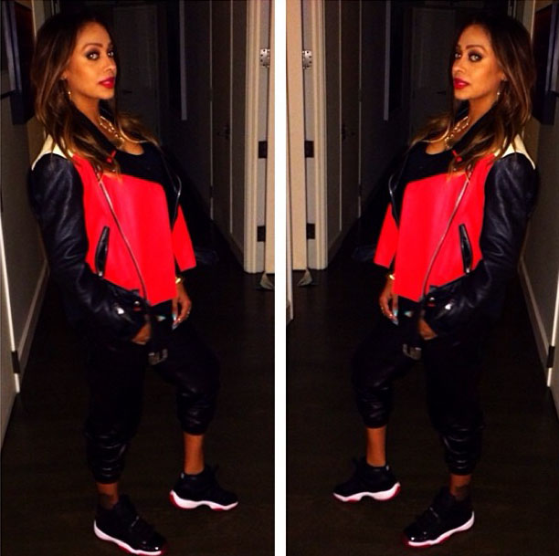 Lala Anthony wearing Air Jordan 11 XI Black/Red