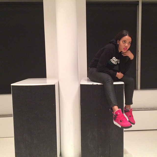 Angela Simmons wearing Air Jordan 4 Retro Cherry