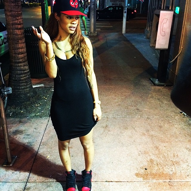 Teyana Taylor wearing Air Jordan 1 I Black/Red