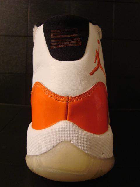 Orange and best sale white jordans 11