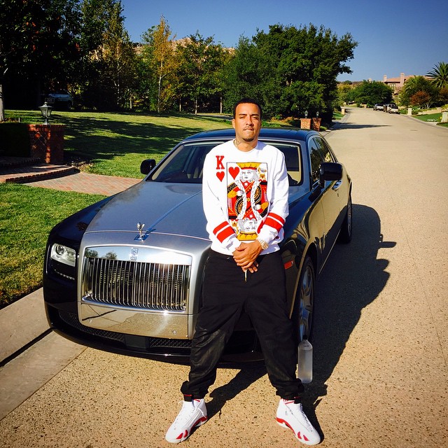 French Montana wearing Air Jordan XIV 14 White/Red