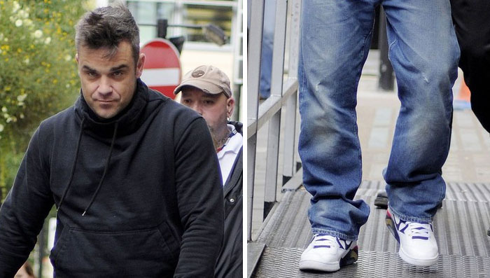 Robbie Williams wearing Nike Air Force 180 Olympic