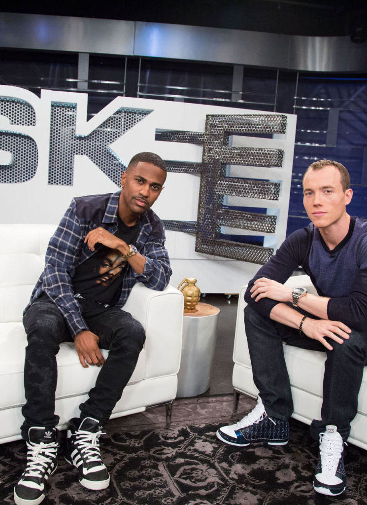 Big Sean wearing adidas Originals Rivalry Hi; DJ Skee wearing Air Jordan XX3 23 Wizards