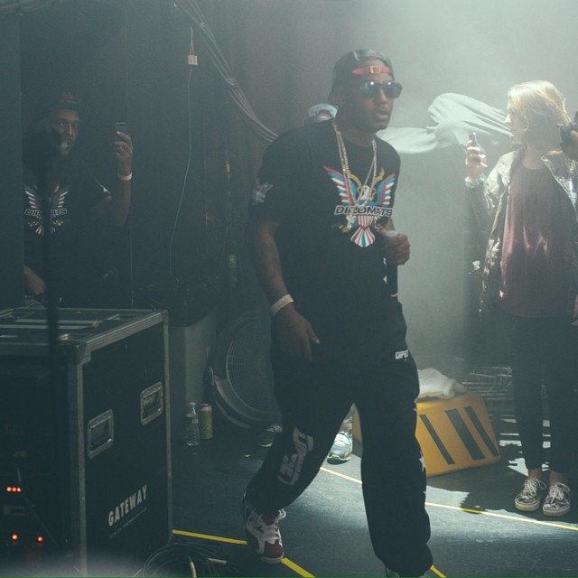 Cam'ron wearing Air Jordan VI 6 Carmine