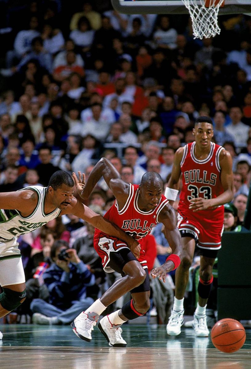 michael jordan wearing jordan 5 fire red