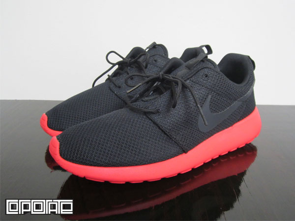 black nike with red soles