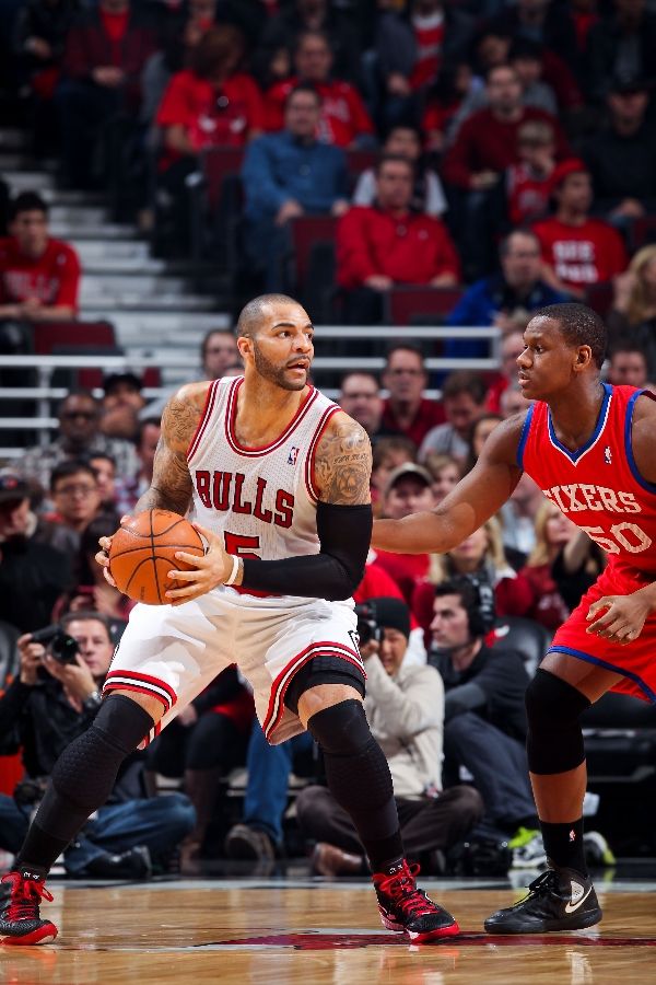 Carlos Boozer wearing Nike Zoom Hyperdunk 2011 Supreme