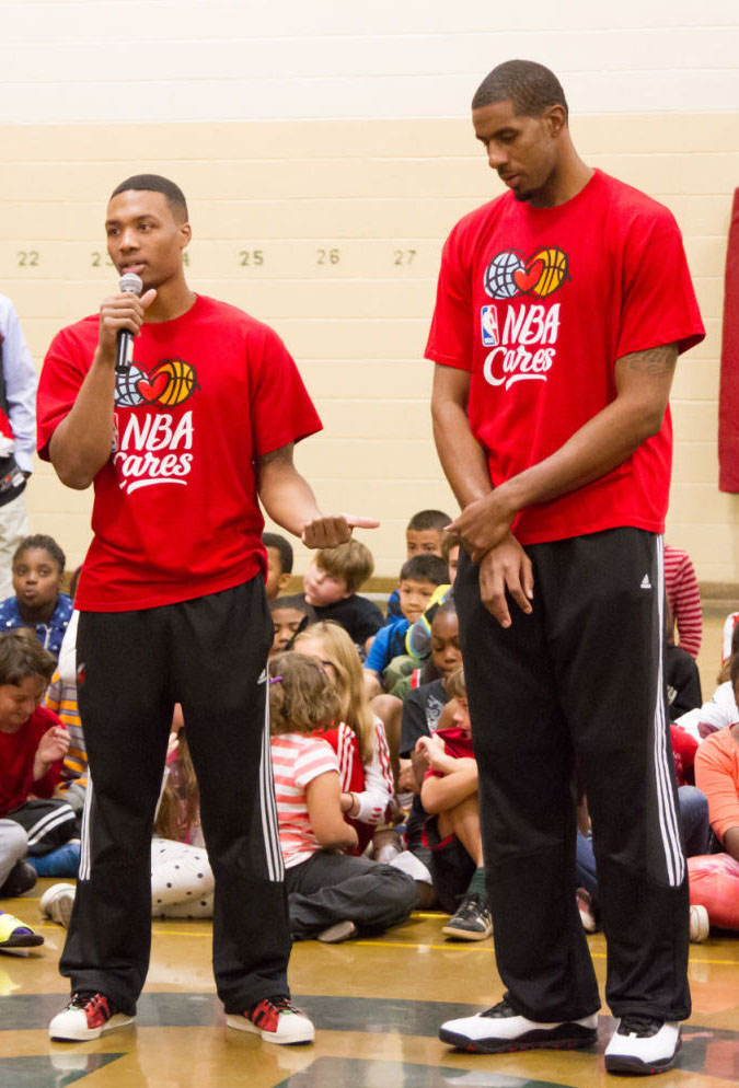 Damian Lillard wearing adidas Originals Superstar; LaMarcus Aldridge wearing Air Jordan 10 X Retro Chicago