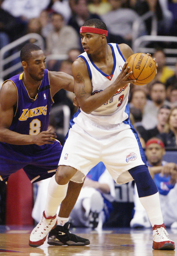 Quentin Richardson wearing Air Jordan XIII 13 Phoenix Suns Home Orange PE  (2)