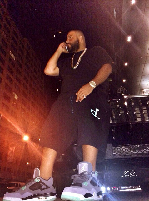 DJ Khaled wearing Air Jordan IV 4 Green Glow