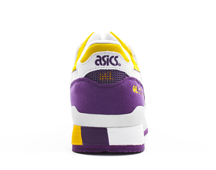 purple and yellow tennis shoes