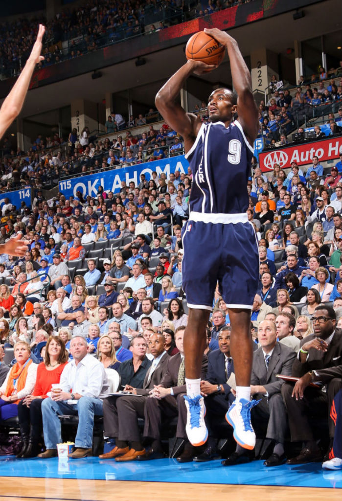 Serge Ibaka wearing Oklahoma City Thunder Alternate and adidas adizero Ghost 2