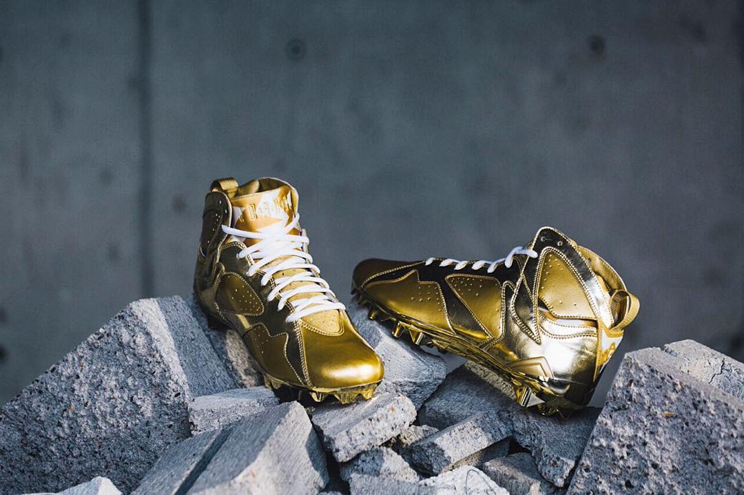 gold jordan cleats