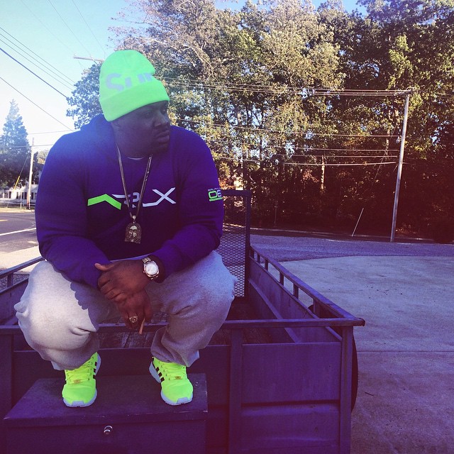 Smoke DZA wearing adidas ZX Flux Electricity