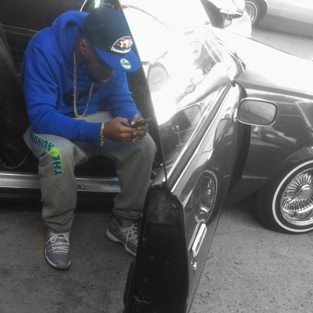 Currensy wearing Air Jordan 11 Cool Grey