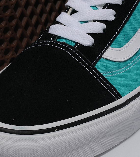 black and turquoise vans