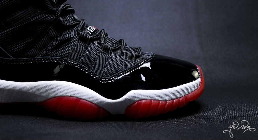 Black and red jordan hot sale 11