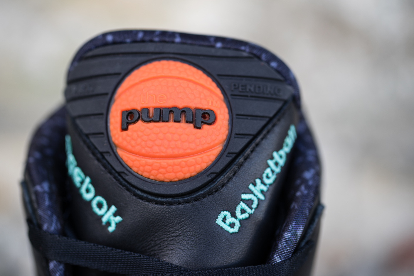 reebok pump button