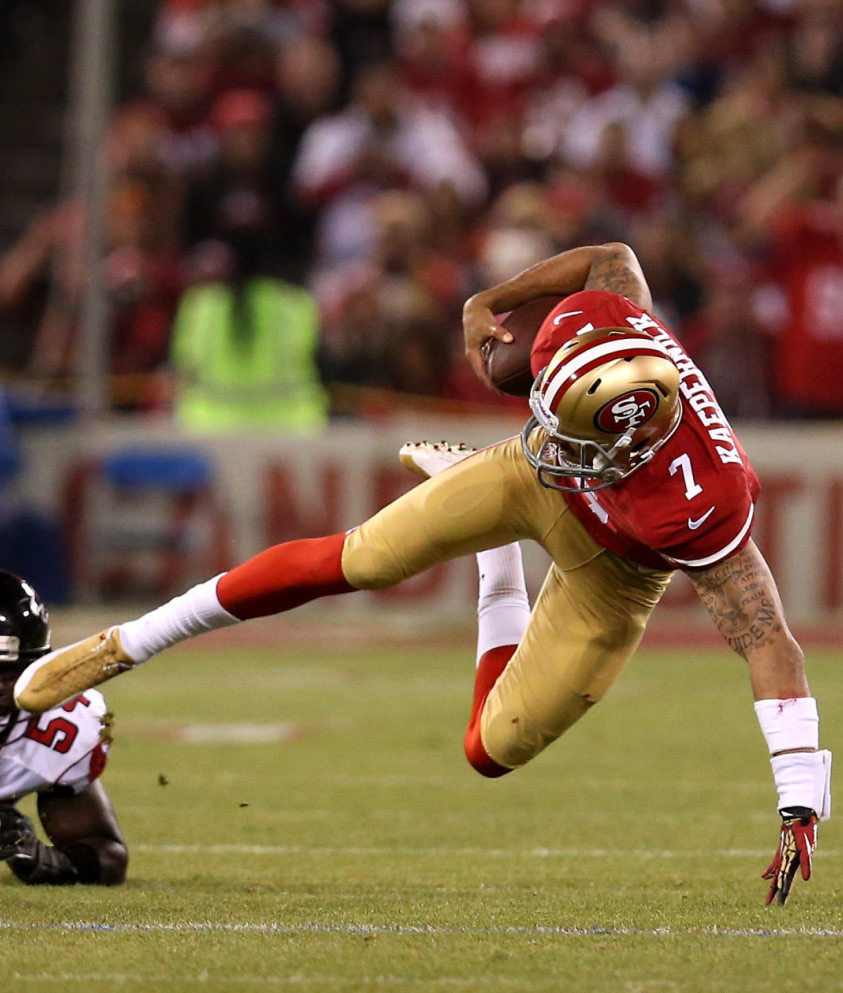 Colin Kaepernick wearing Air Jordan 12 PE Cleats (2)