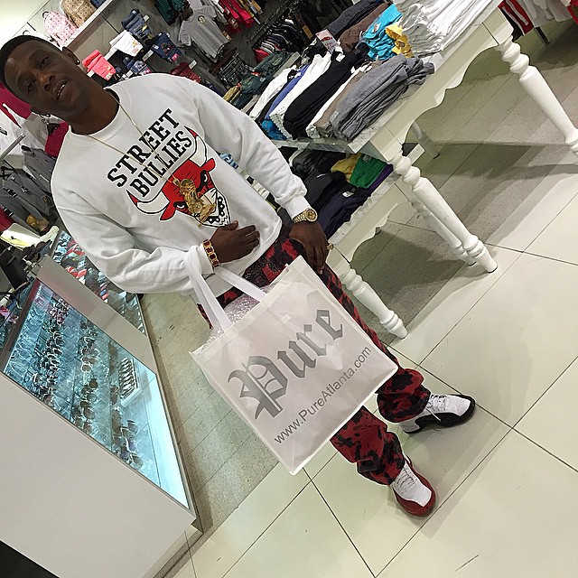 Boosie wearing Mismatched Air Jordan 12