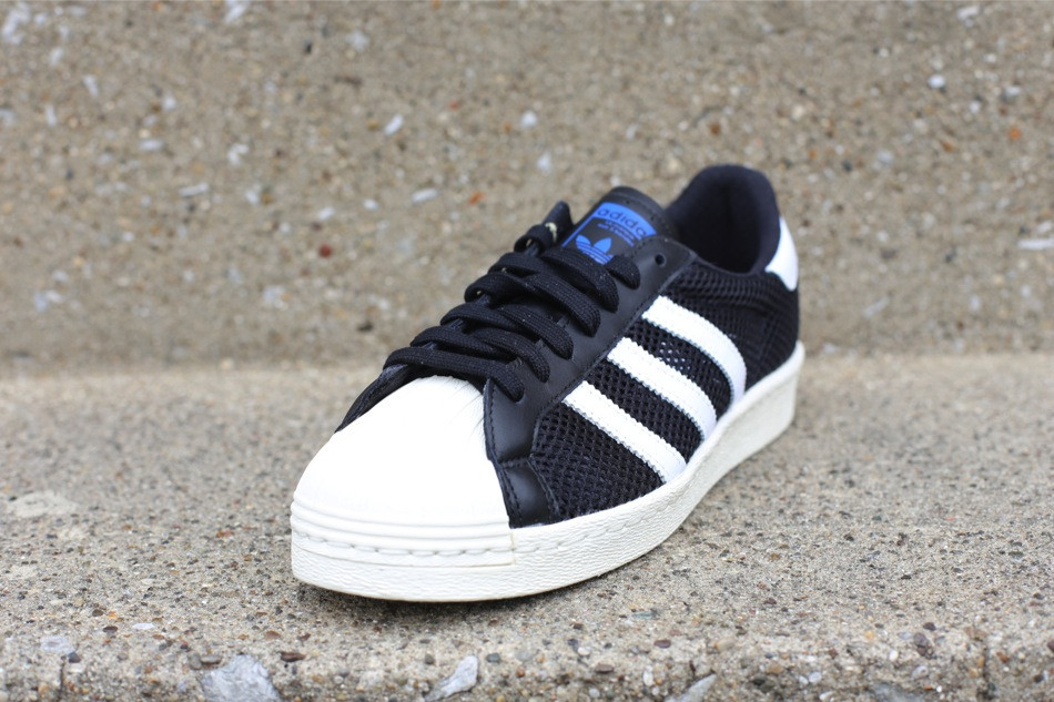 Adidas superstar black 2025 and white mesh