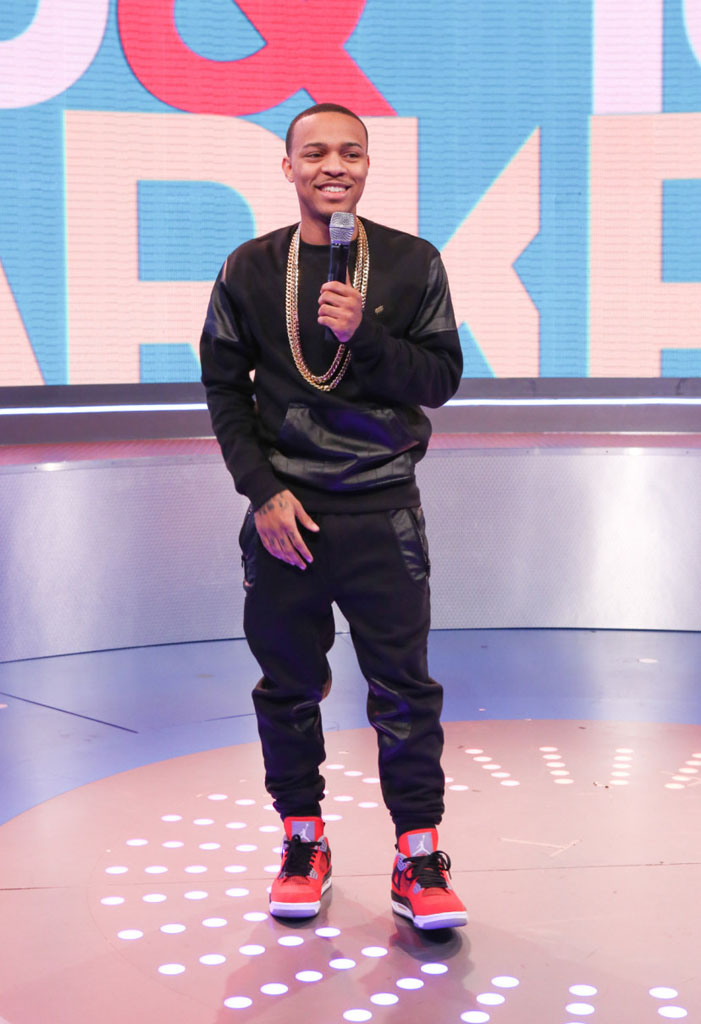 Bow Wow wearing Air Jordan 4 Retro Toro