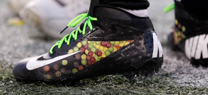 Marshawn Lynch wearing Nike Vapor Talon Elite Skittles (2)