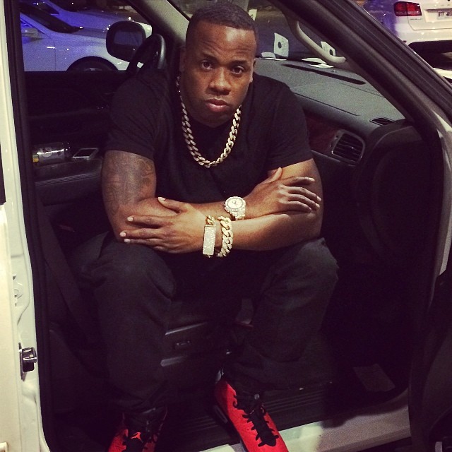 Yo Gotti wearing Air Jordan 6 Retro Infrared 23