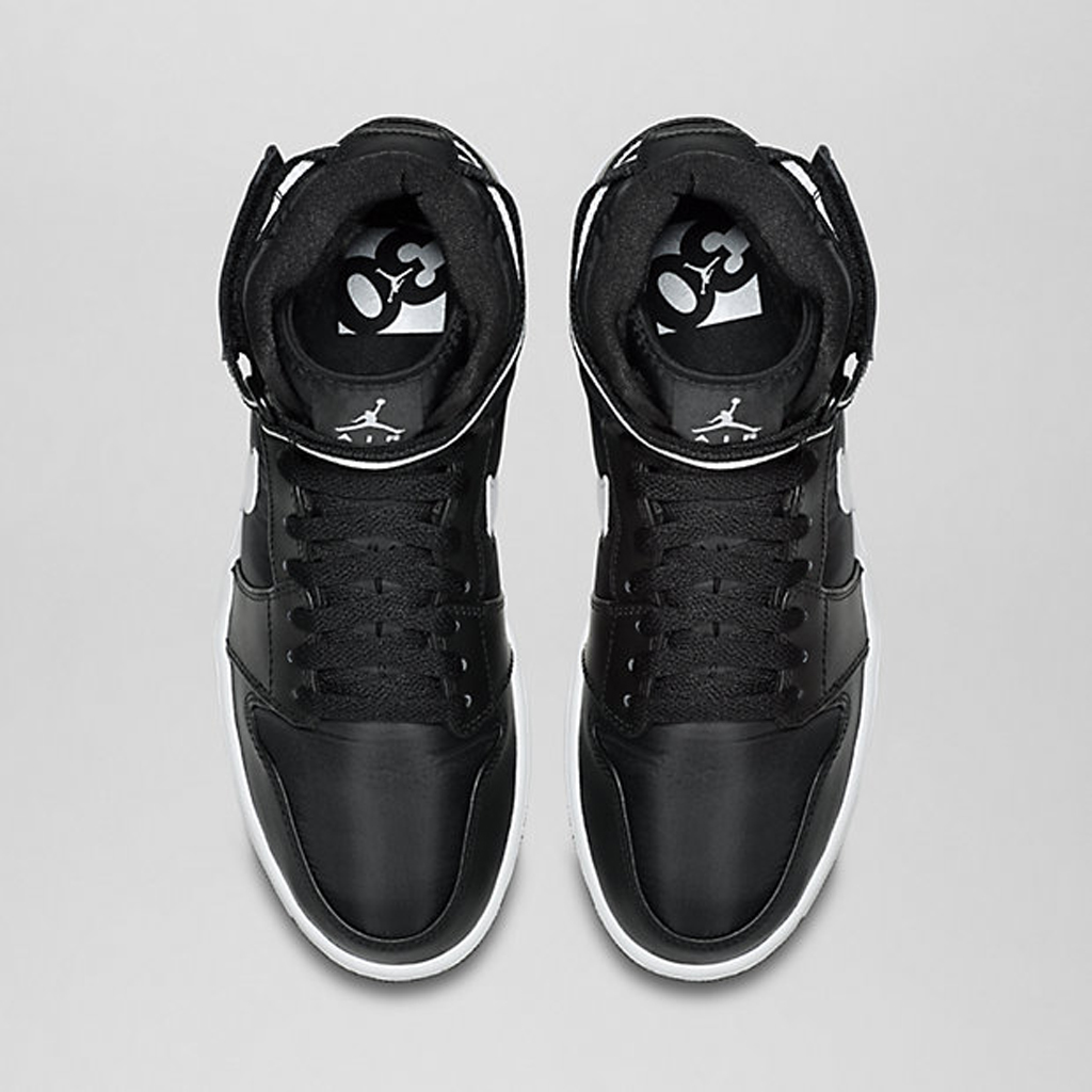 black and white jordans with straps