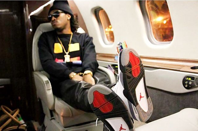 Future wearing Air Jordan IV 4 Cement