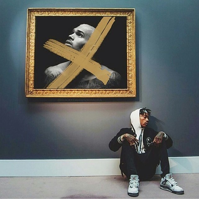 Wiz Khalifa wearing Air Jordan IV 4 Cement