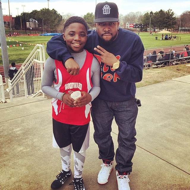 Big Boi wearing Air Jordan 5 V Retro Fire Red