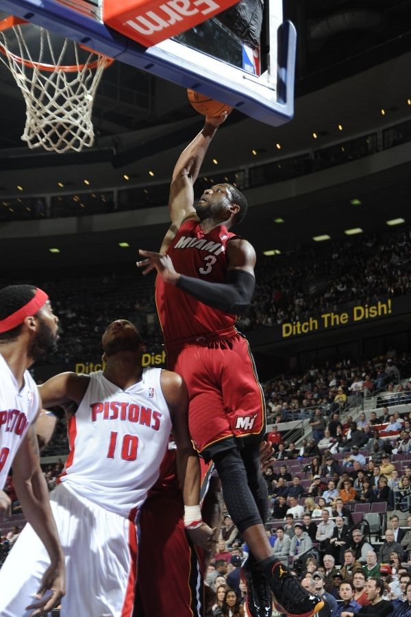 Dwyane Wade wears Black/Red/Orange Air Jordan 2011 PE against Pistons