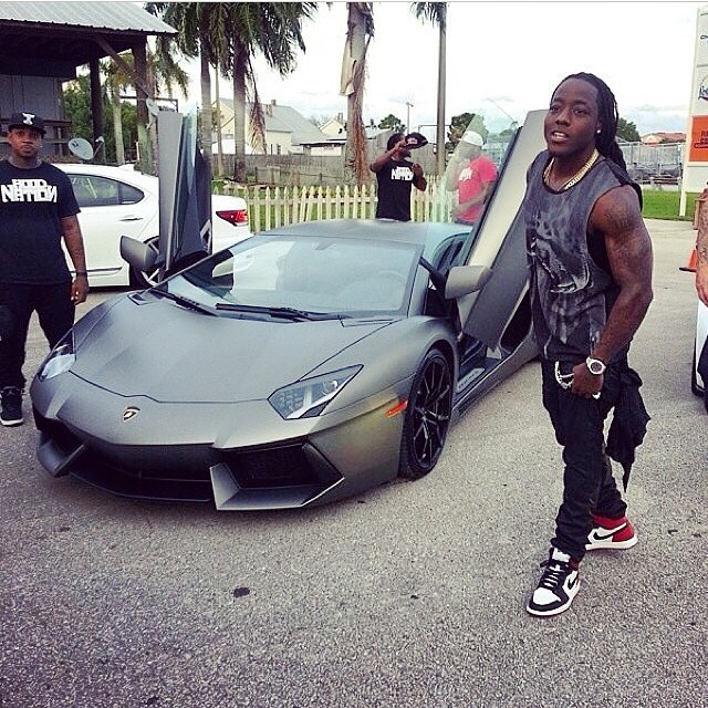 Ace Hood wearing Air Jordan I 1 Black Toe