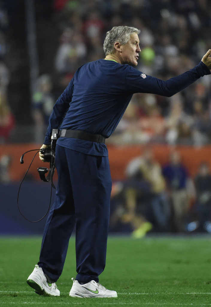 Pete Carroll wearing Nike Air Monarch PE