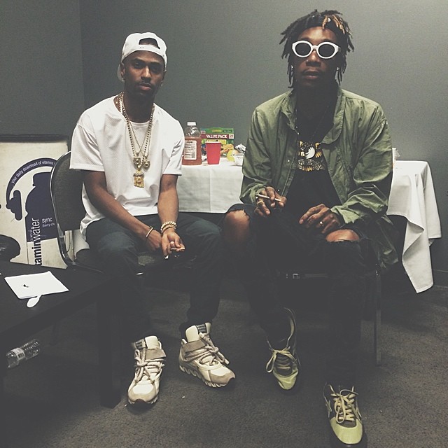 Big Sean wearing Camper Himalayan; Wiz Khalifa wearing BAPE Roadsta