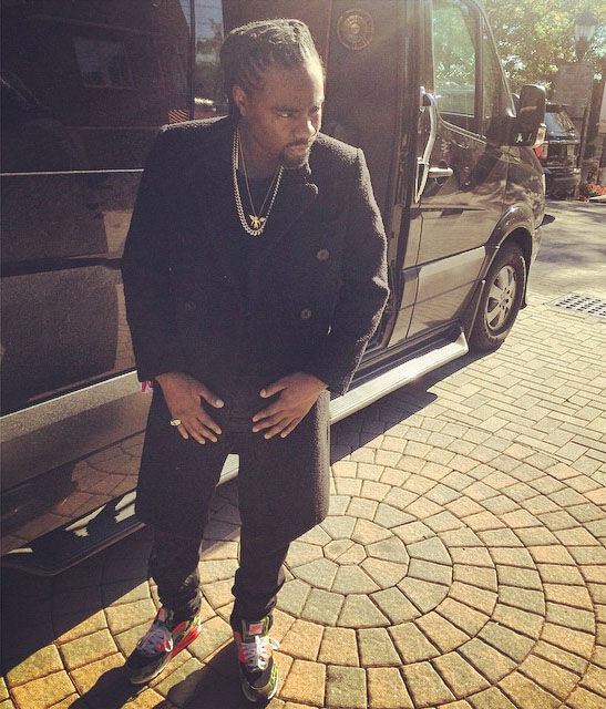 Wale wearing atmos x Nike Air Max 90 Camo