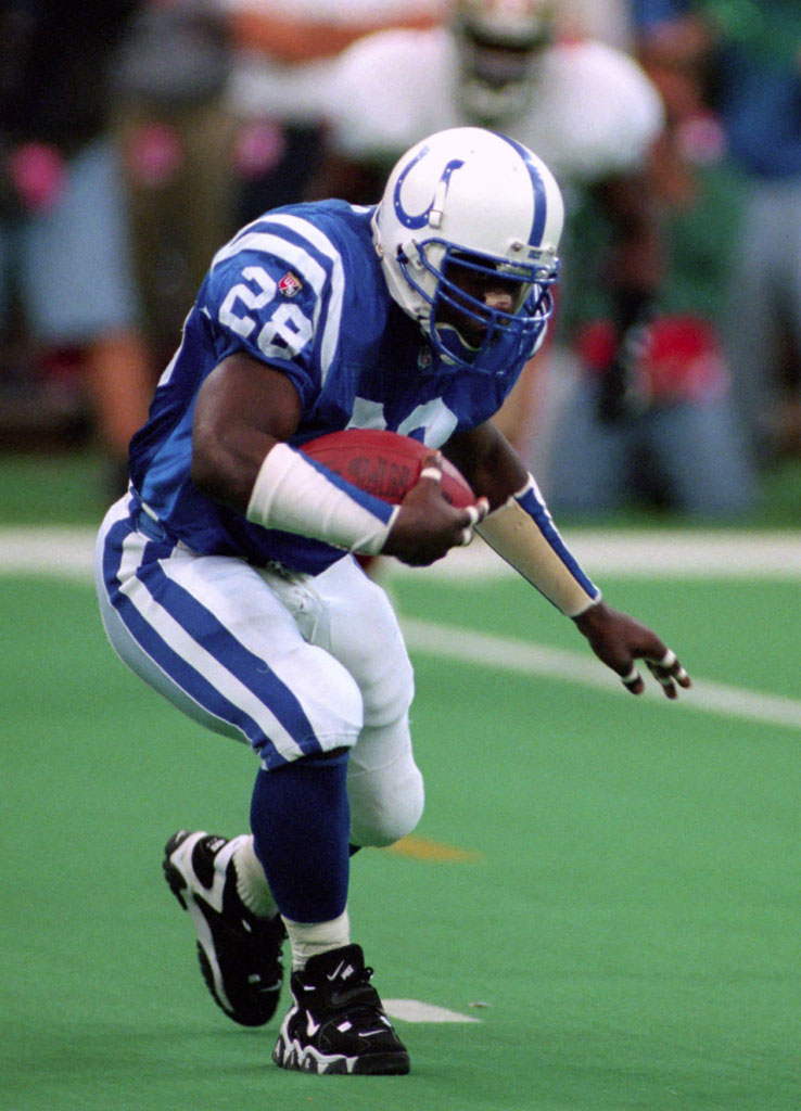 Marshall Faulk wearing Nike Air Barrage (1995)