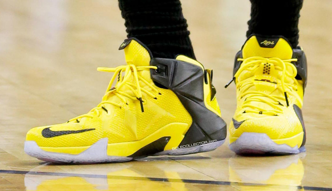 lebron james shoes black and yellow