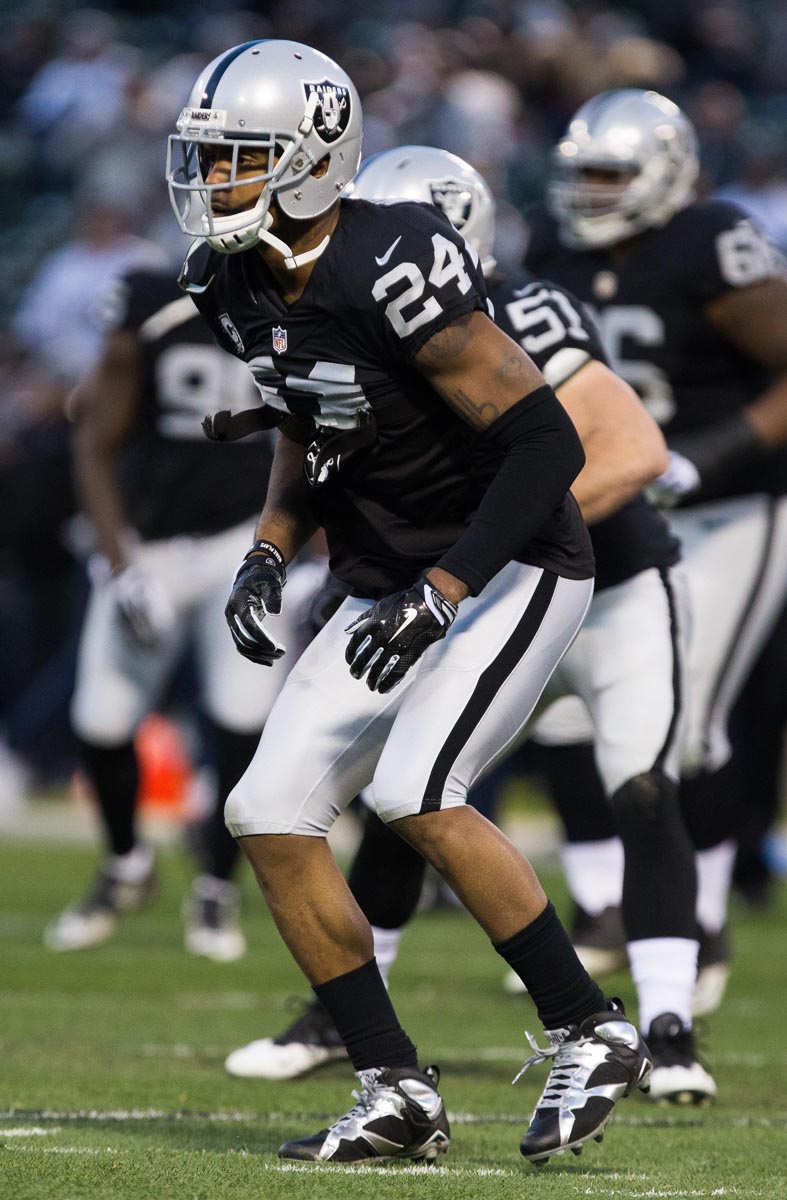 Charles Woodson Oakland Raiders Autographed 16 x 20 Stance Photograph  with HOF 21 Inscription