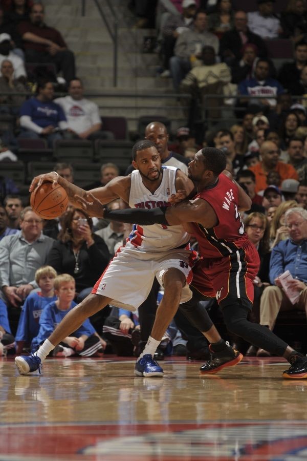 Dwyane Wade wears Black/Red/Orange Air Jordan 2011 PE against Pistons