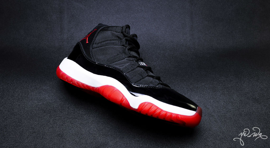 Black and red jordan 11 sale