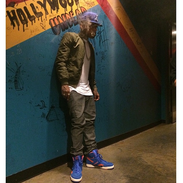 Kid Ink wearing Reebok BB4600